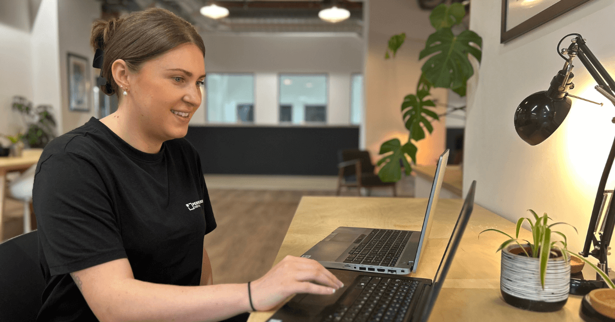 Charlotte from Perfect Pixels Digital working on an eCommerce project